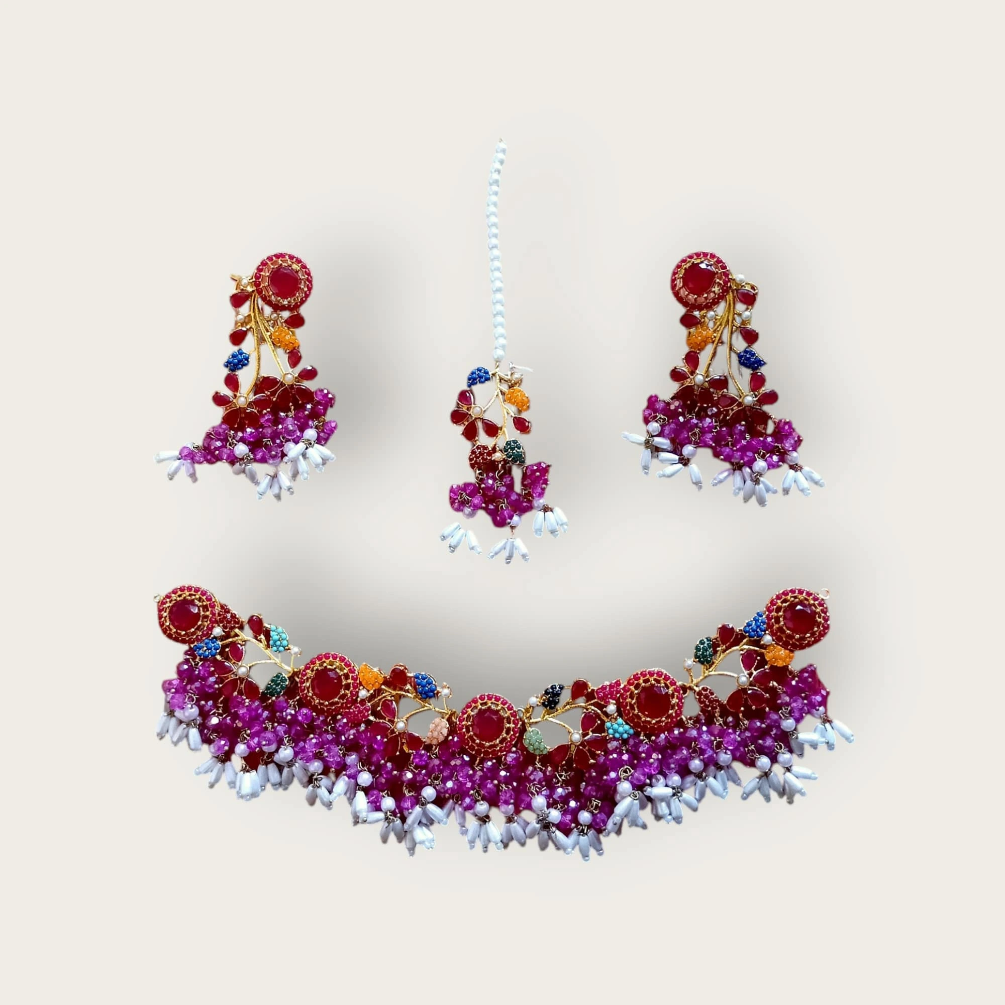 Buy multi colour jewellery set with necklace , earrings and tikka at best price in pakistan